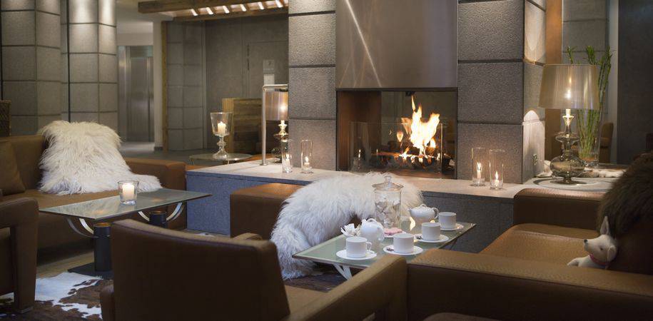 The lounge welcomes you with a log fire